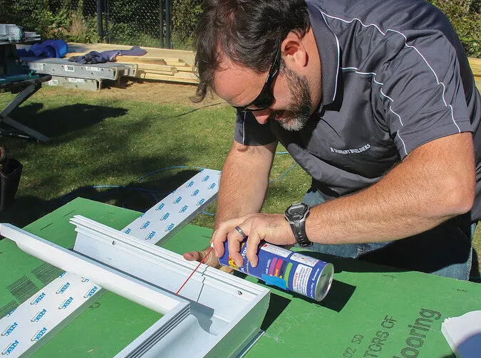 m duffany builders' kevin walsh performing a duragutter installation for a cape cod restoration project